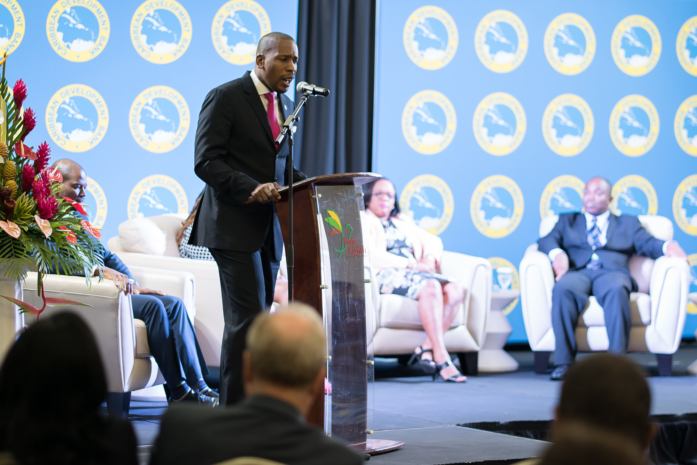 Timothy Antoine, Governor of the Eastern Caribbean Central Bank (ECCB) delivers his keynote presentation during the seminar on Building Resilient Cities, hosted by the Caribbean Development Bank (CDB) in Grenada on May 30.