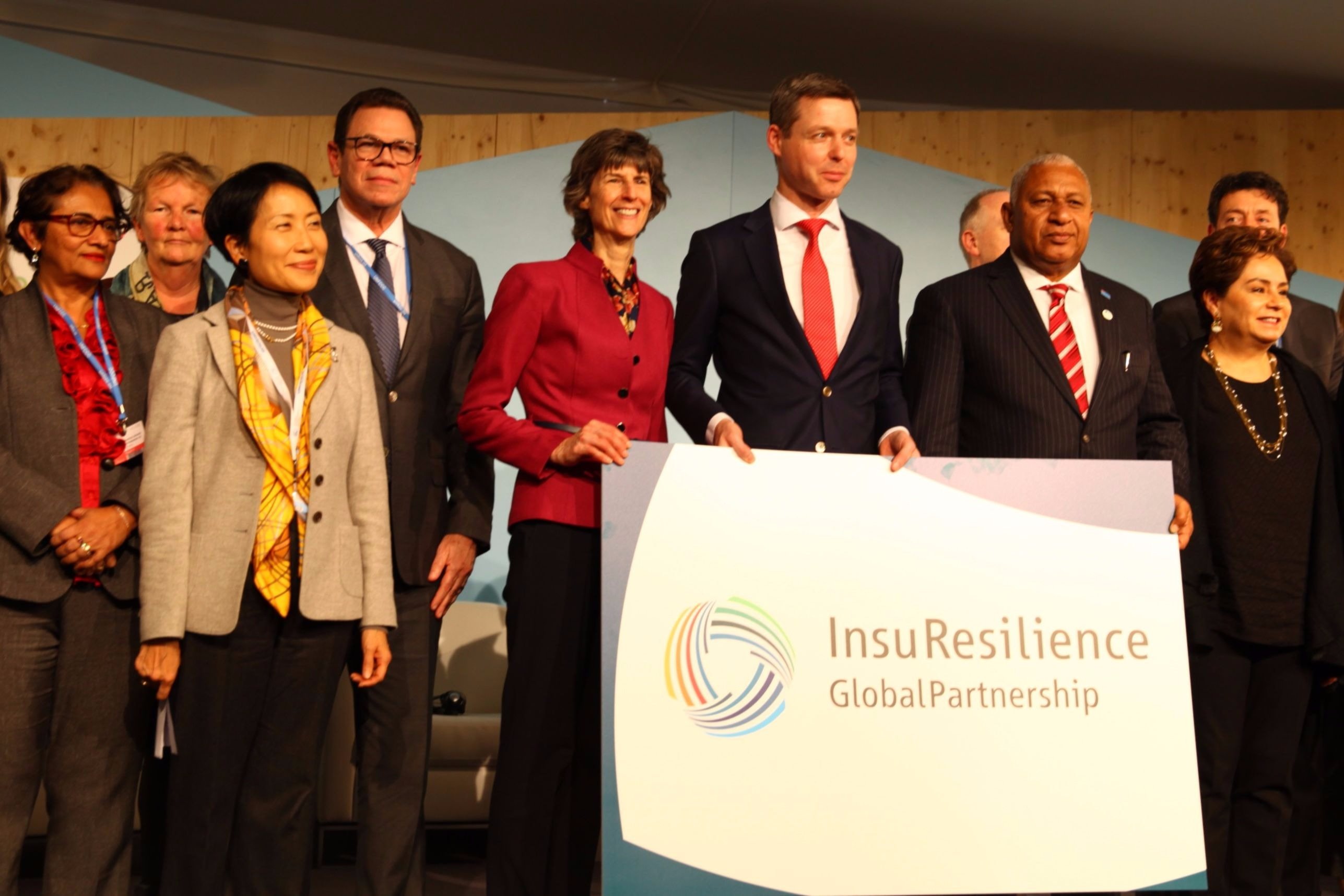 (fourth from left) joins officials for a group photo during one of five high-level events convened by the COP23 Presidency in Bonn, Germany.