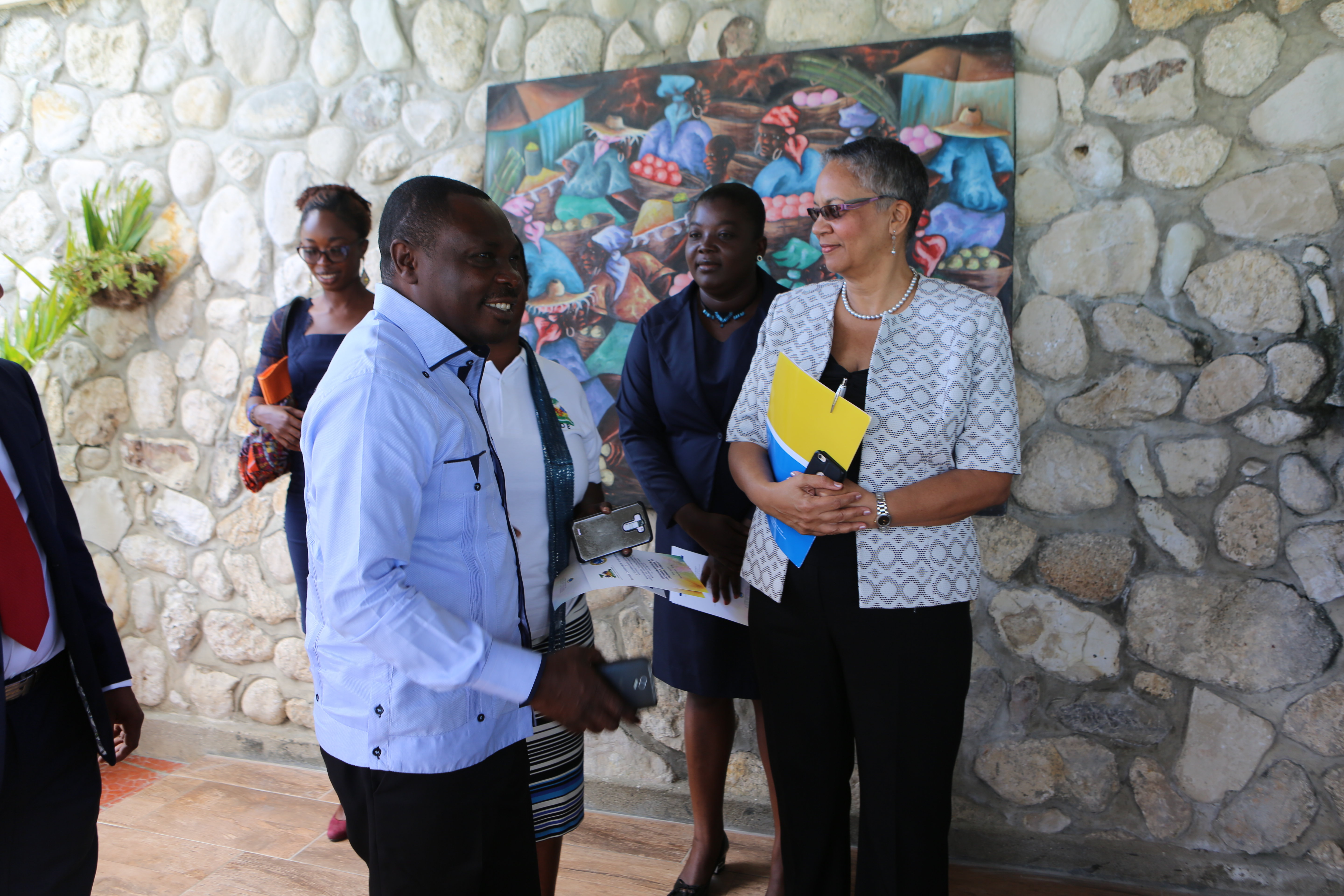 H.E. Pierre Simon Georges, Minister of Environment, Haiti (Left) and Monica La Bennett, Vice-President (Operations), CDB, discuss how the project will positively impact the lives of Ile-à-Vache’s residents.