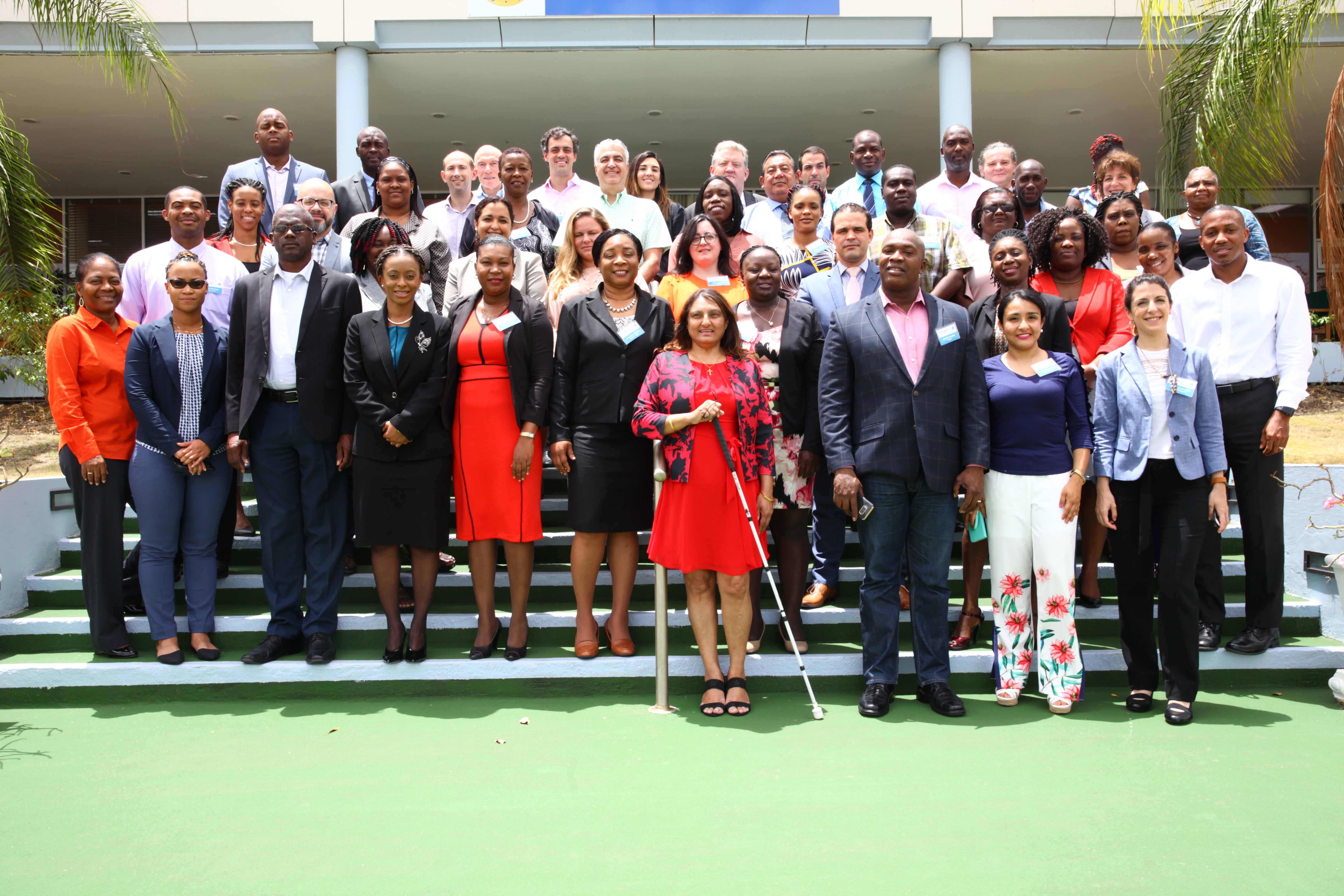 Participants of the Procurement in Emergency Situations Workshop gather for a group photo at the Caribbean Development Bank.
