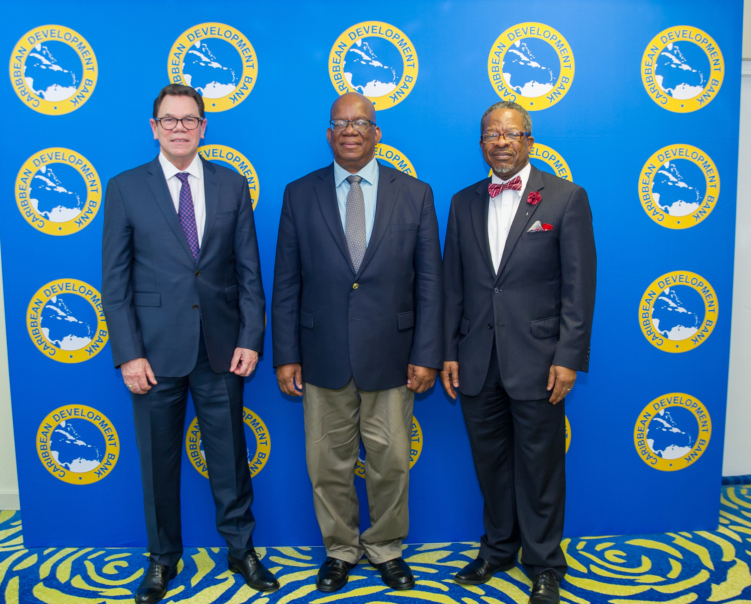 (L-R) Dr. Wm. Warren Smith, President, CDB; Hon. Winston Jordan, Minister of Finance, Guyana and Ivelaw Lloyd Griffith, Vice-Chancellor of the University of Guyana, at the signing of the grant agreement.