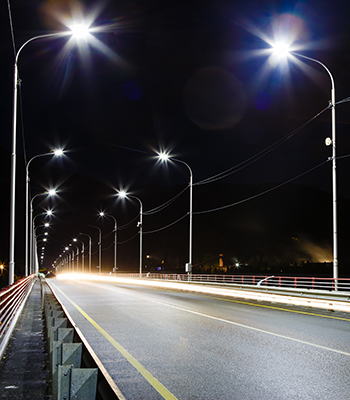 Night image of a road on a bridge with LED lighting