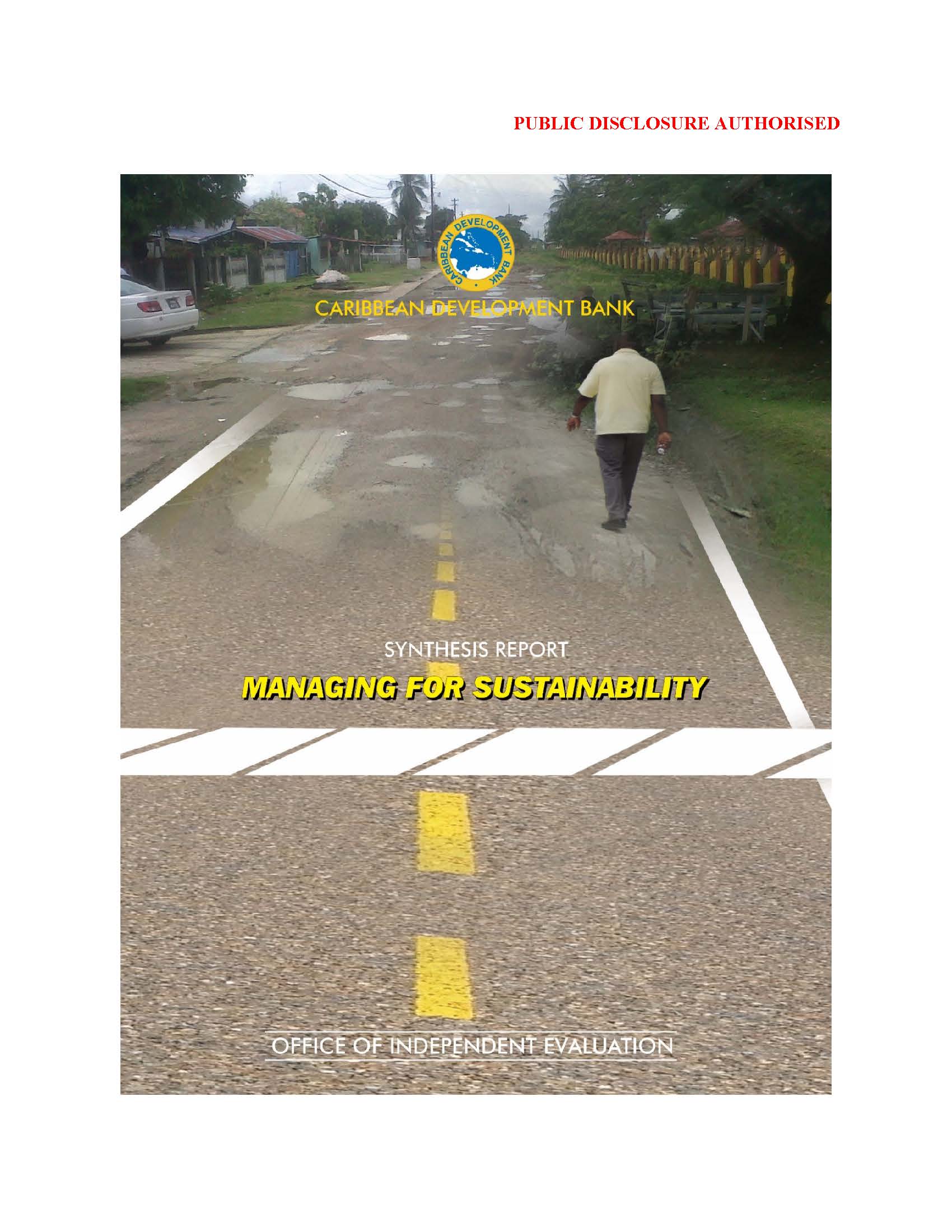 man walking along a road with broken yellow lines along the middle