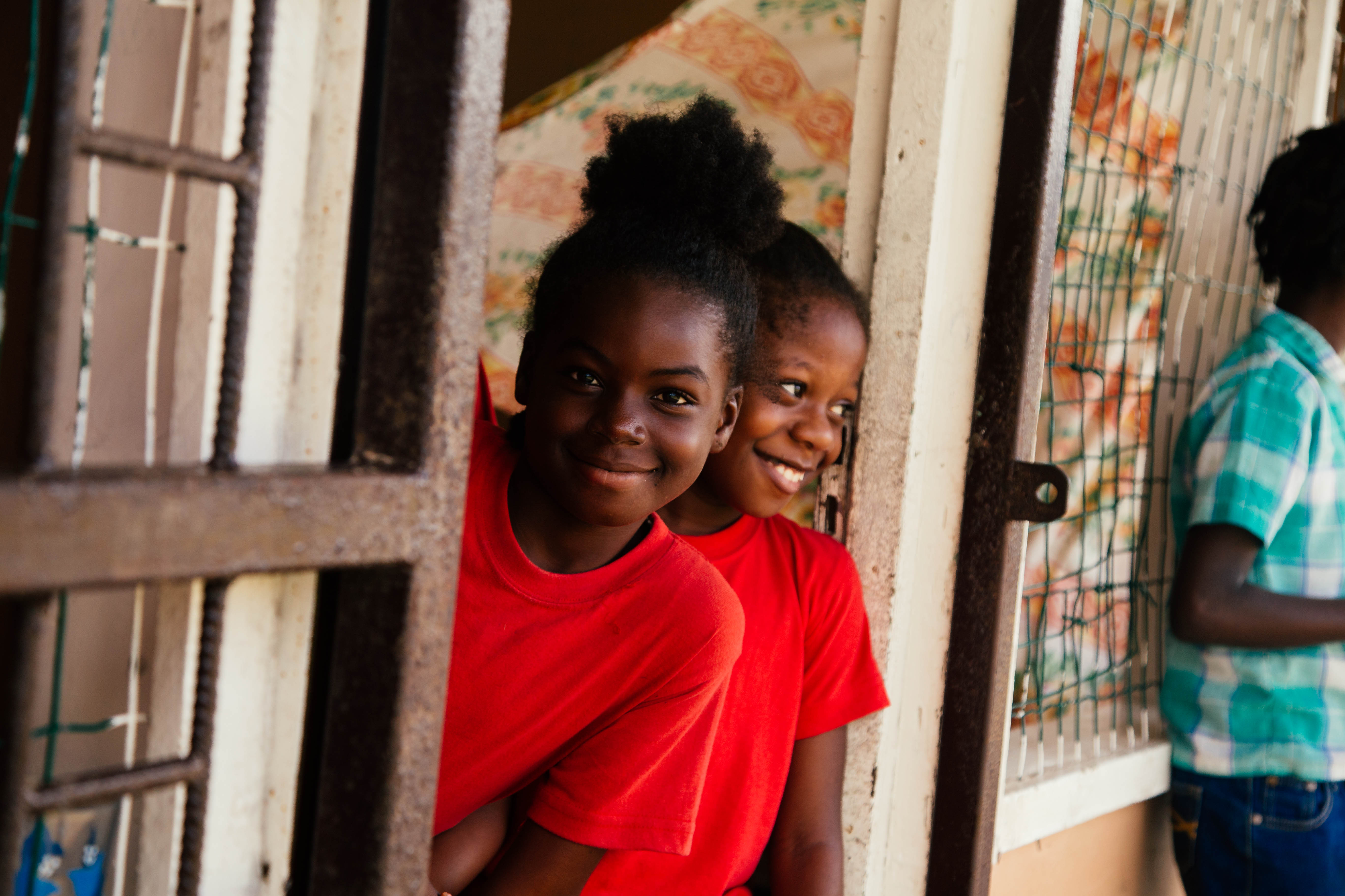 kids looking out of a window