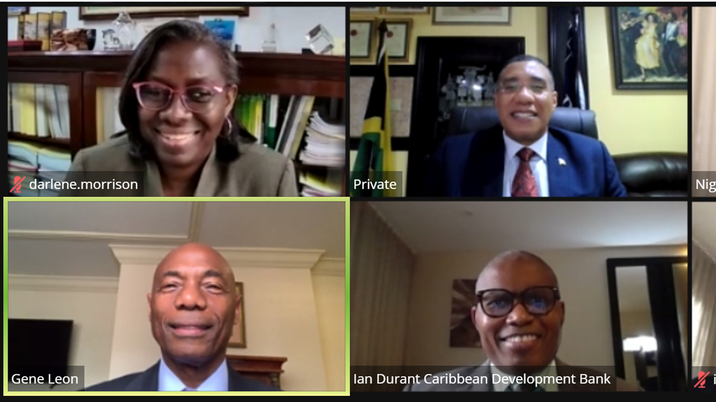 Screenshot of virtual meeting CDB President Dr Gene Leon, Jamaican Prime Minister Andrew Holness and CDB Vice-President of Operations Isaac Solomon, wearing dark suits, and Jamaican Financial Secretary Darlene Morrison wearing a dark green blazer 