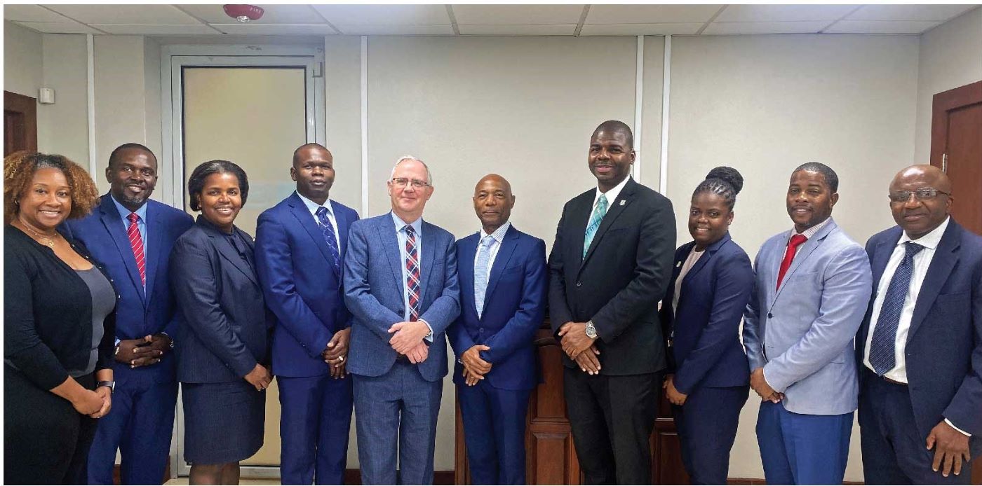 group photo of CDB president Dr Gene Leon with government officials in British Virgin Islands