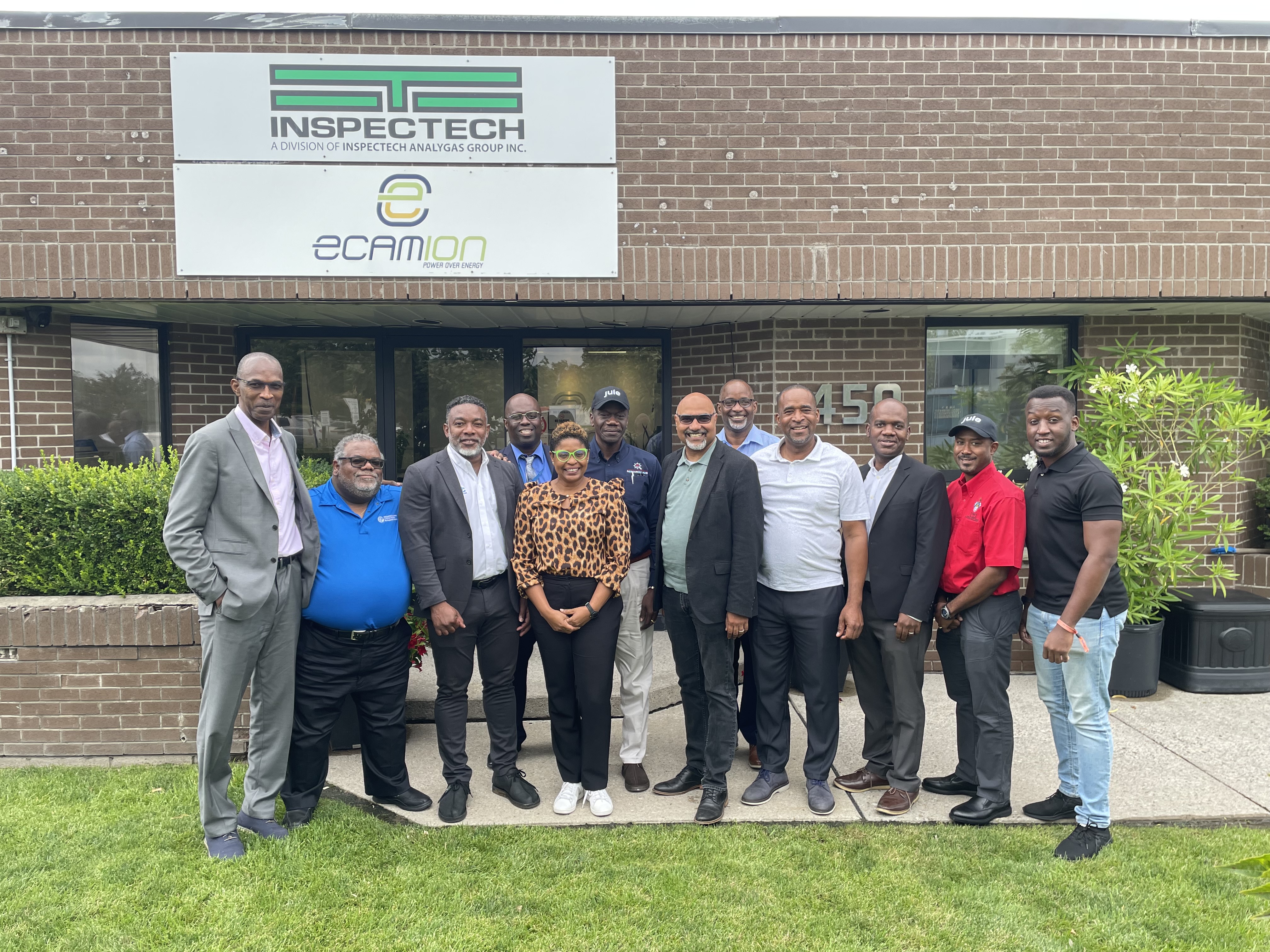 Photo Caption: Electronic Vehicle (EV) Study Tour participants visiting eCamion where they were exposed to the EV charging ecosystem and potential business models for developing EV charging infrastructure in Jamaica and the region.  