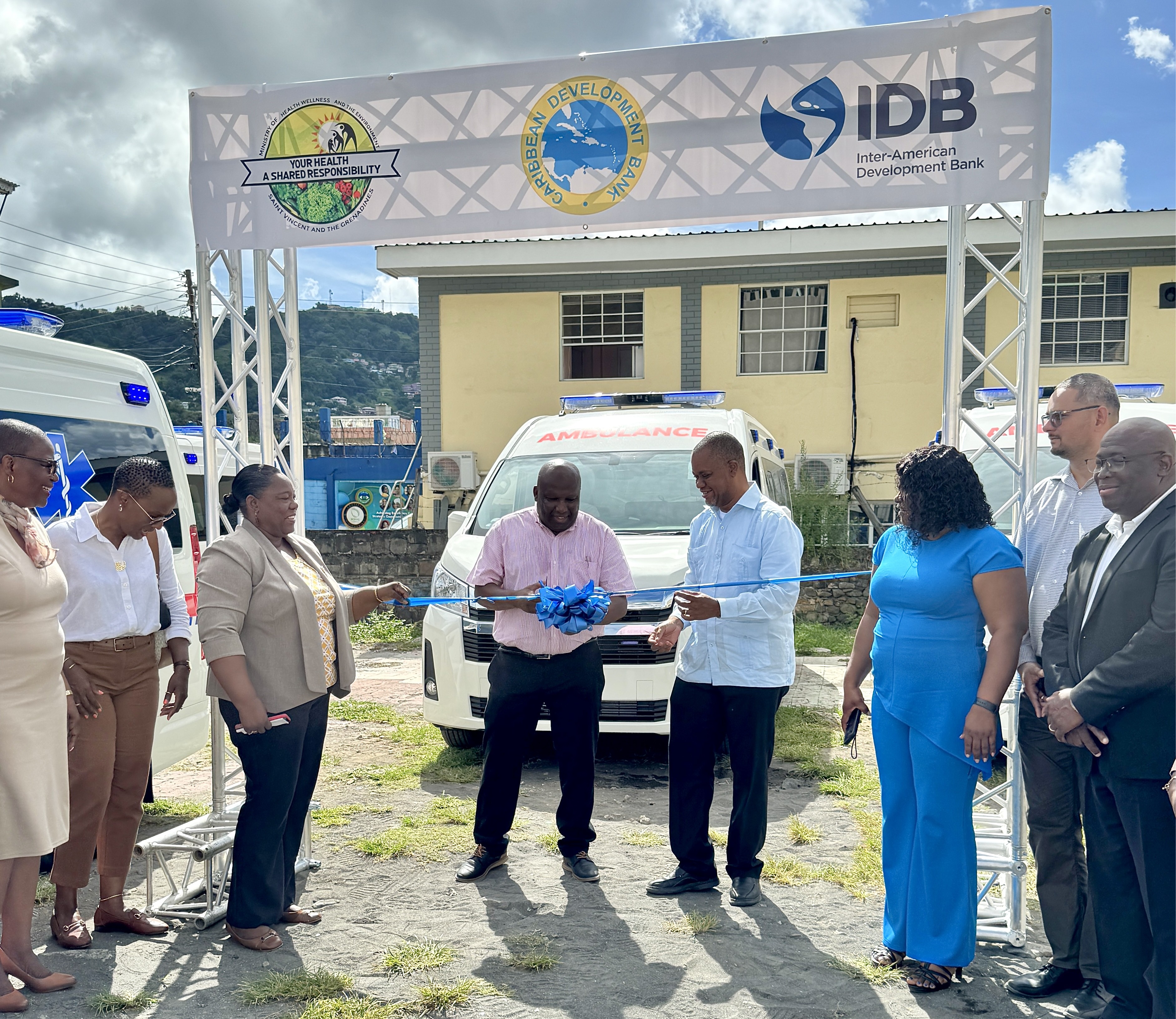 The Honourable St. Clair Prince, Minister of Health, Wellness and the Environment for St. Vincent and the Grenadines joins Mr. L. O’Reilly Lewis, Director Projects (Ag.) for CDB, for the handover of five ambulances under the Improving Response and Resilience of the Health Sector to COVID-19 Project.