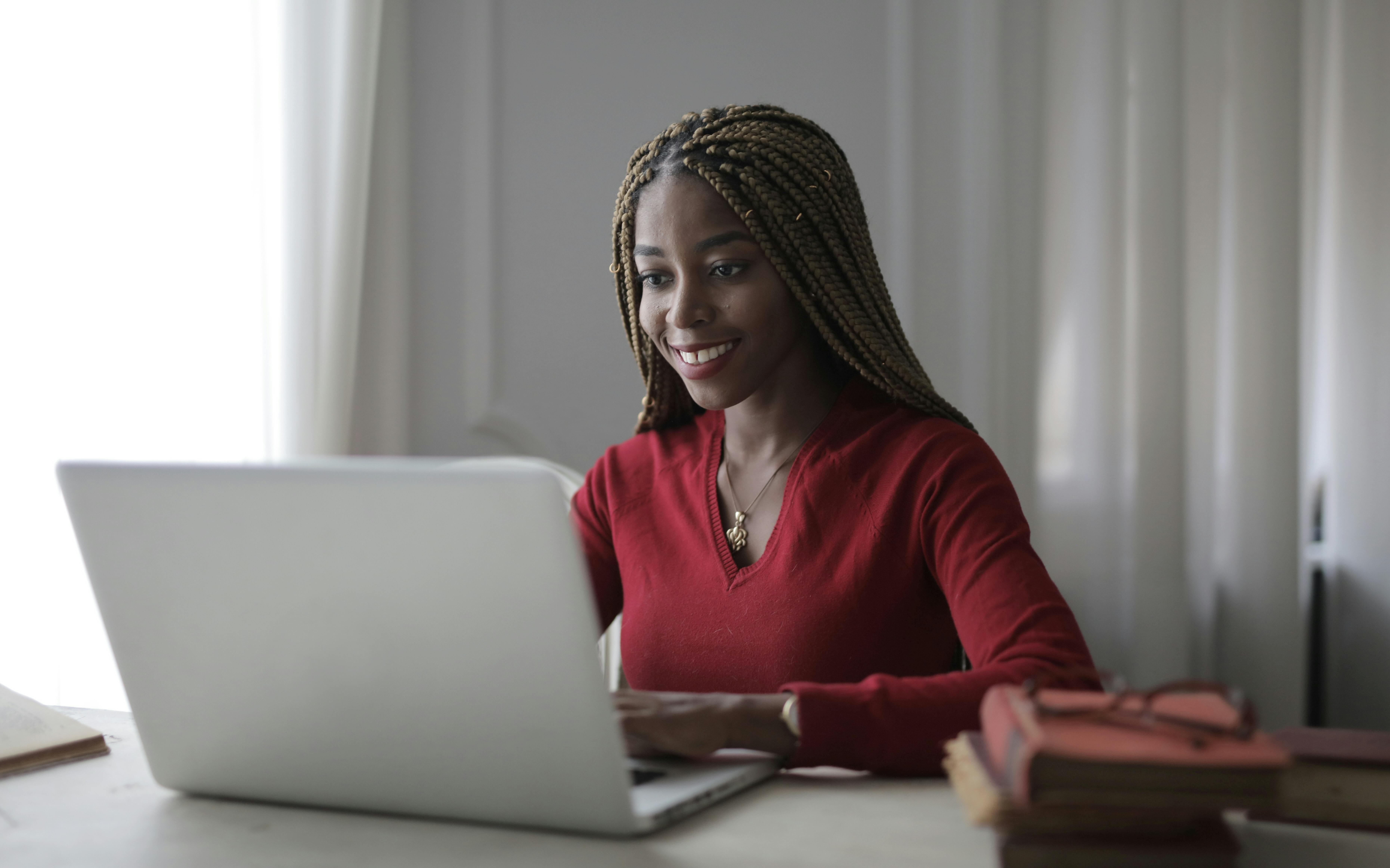 Young woman at her computer