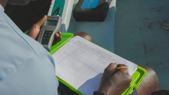 A person taking notes