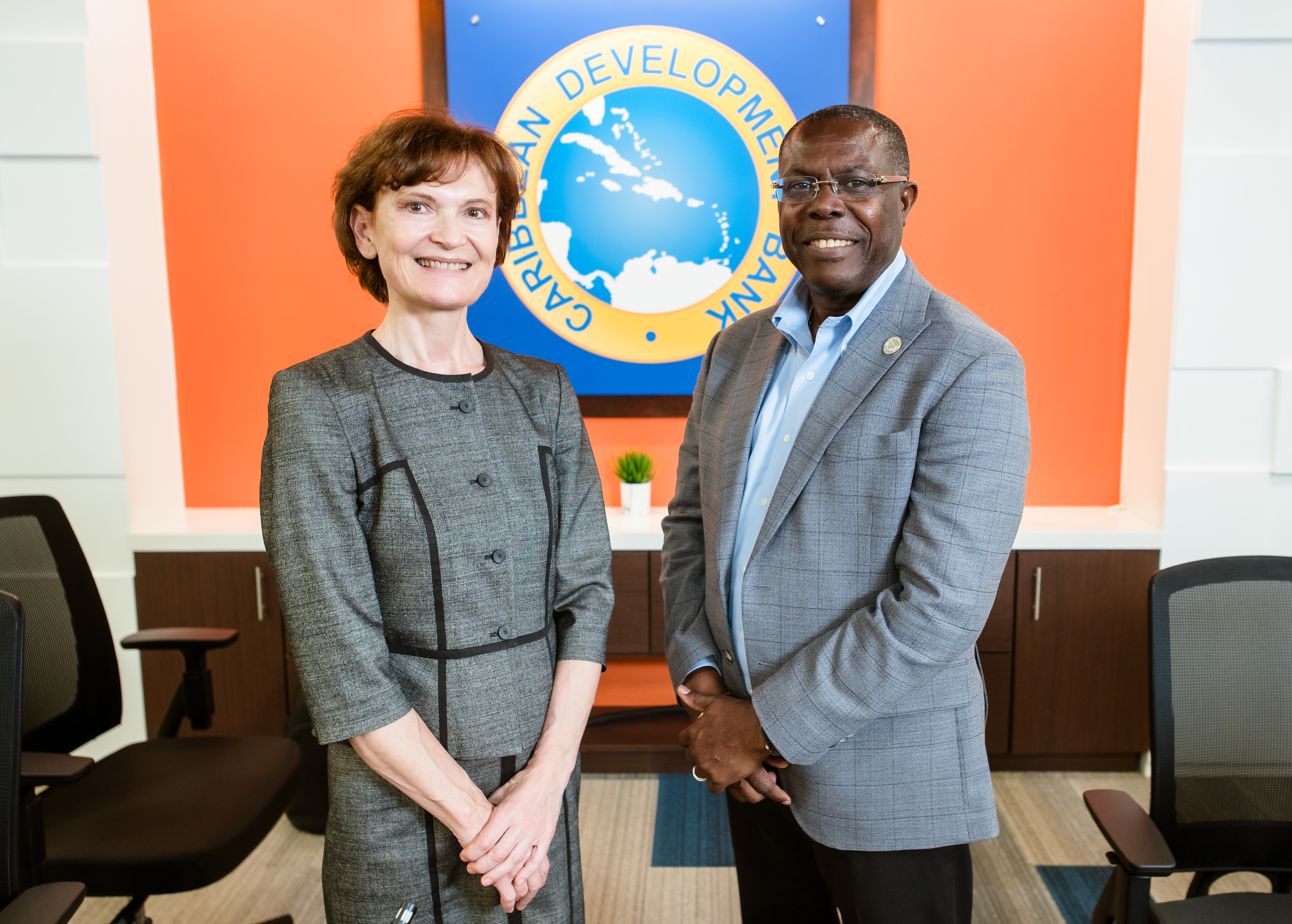 Ms. Lilia Burunciuc, World Bank Director for the Caribbean, and Dr. Isaac Solomon, Vice-President (Operations), Caribbean Development Bank, pose for a photo 