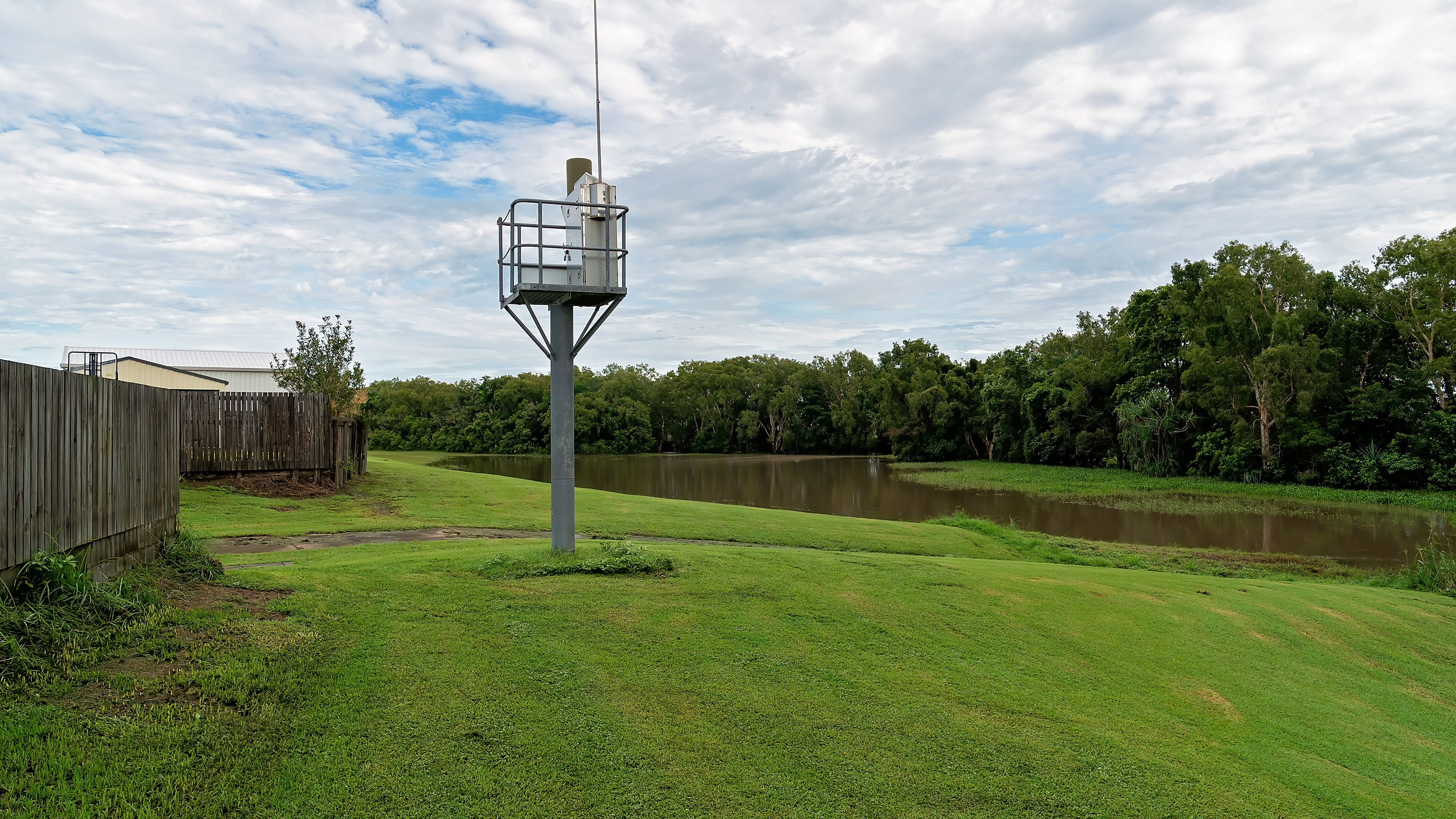 Small tower with detection equipment near a pond