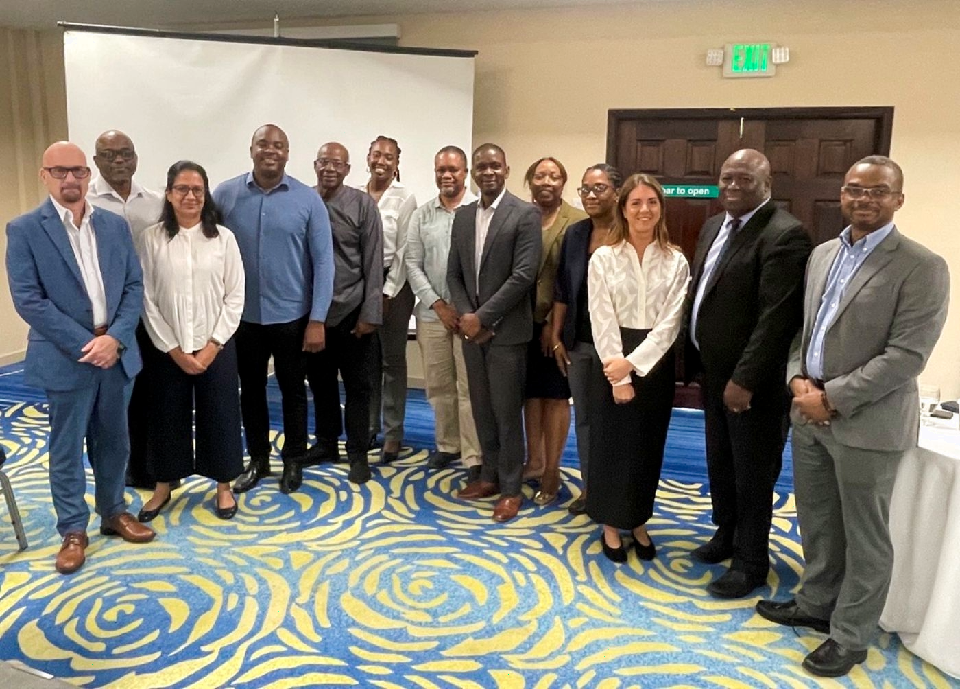 13 officials from the Caribbean Development Bank and the World Bank attend a joint project review in Grenada