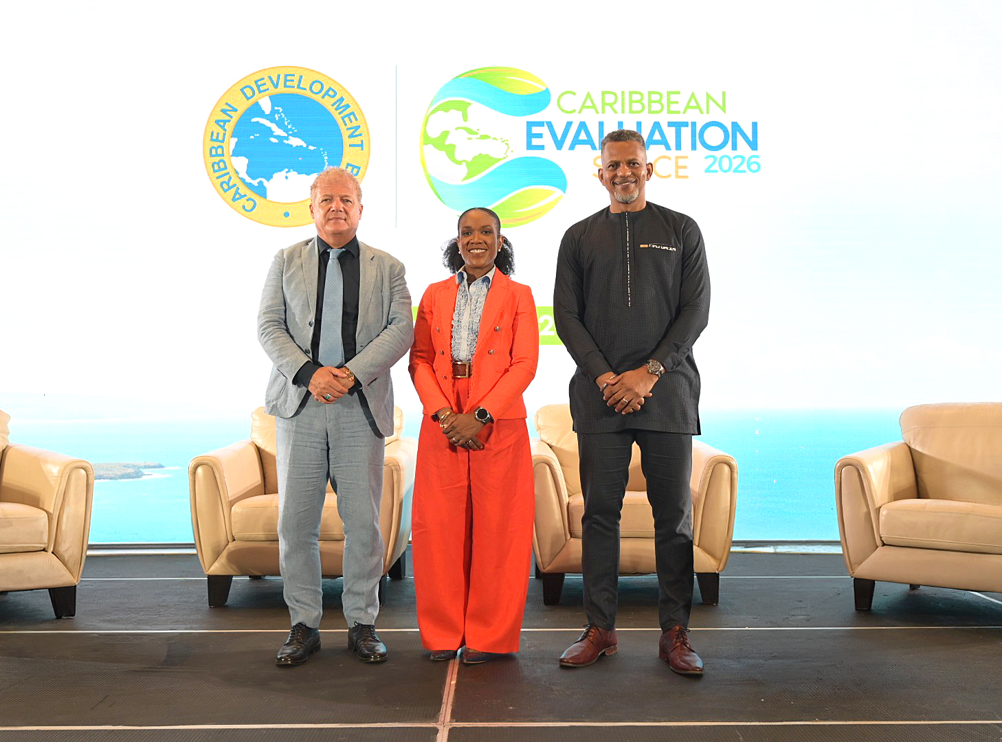 Three keynote speakers on stage at the Caribbean Development Bank's Caribbean Evaluation Space launch