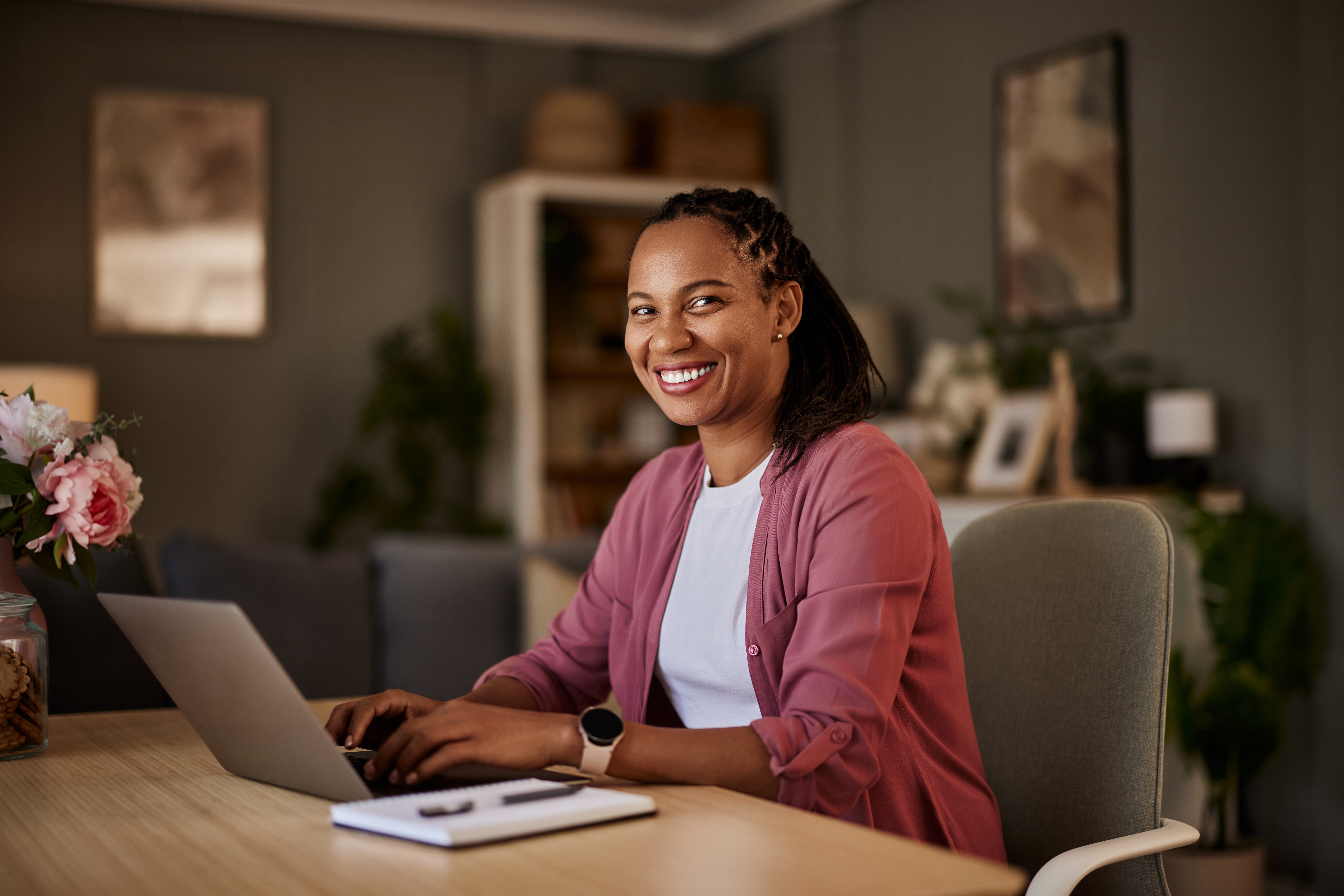 Business woman sitting at desk in office