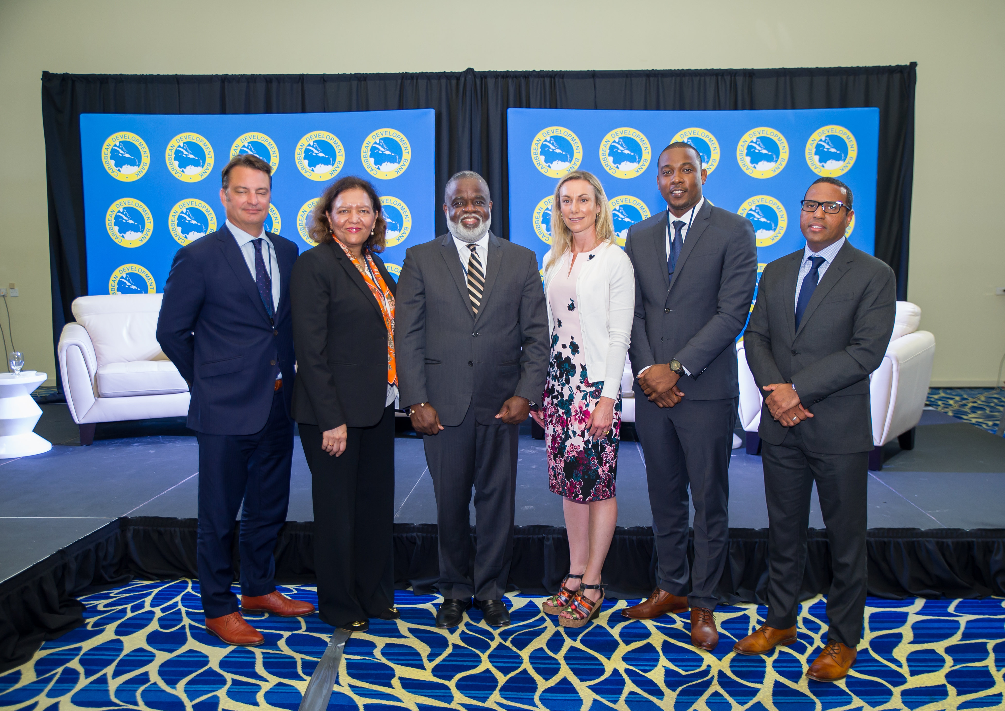 (L-R): Robert Weary, Senior Director, NatureVest, the Nature Conservancy; Tahseen Sayed, Director for the Caribbean, World Bank; Dr. Eric Deans, Chief Executive Officer, Jamaica Special Economic Zone Authority, and Jamaica Logistics Hub Initiative Task Force; Gail Hurley, Development Finance Policy Specialist, UNDP; Presenter, Dr. Roger McLeod, Country Economist, CDB; and Dr. Justin Ram, Director, Economics Department, CDB.