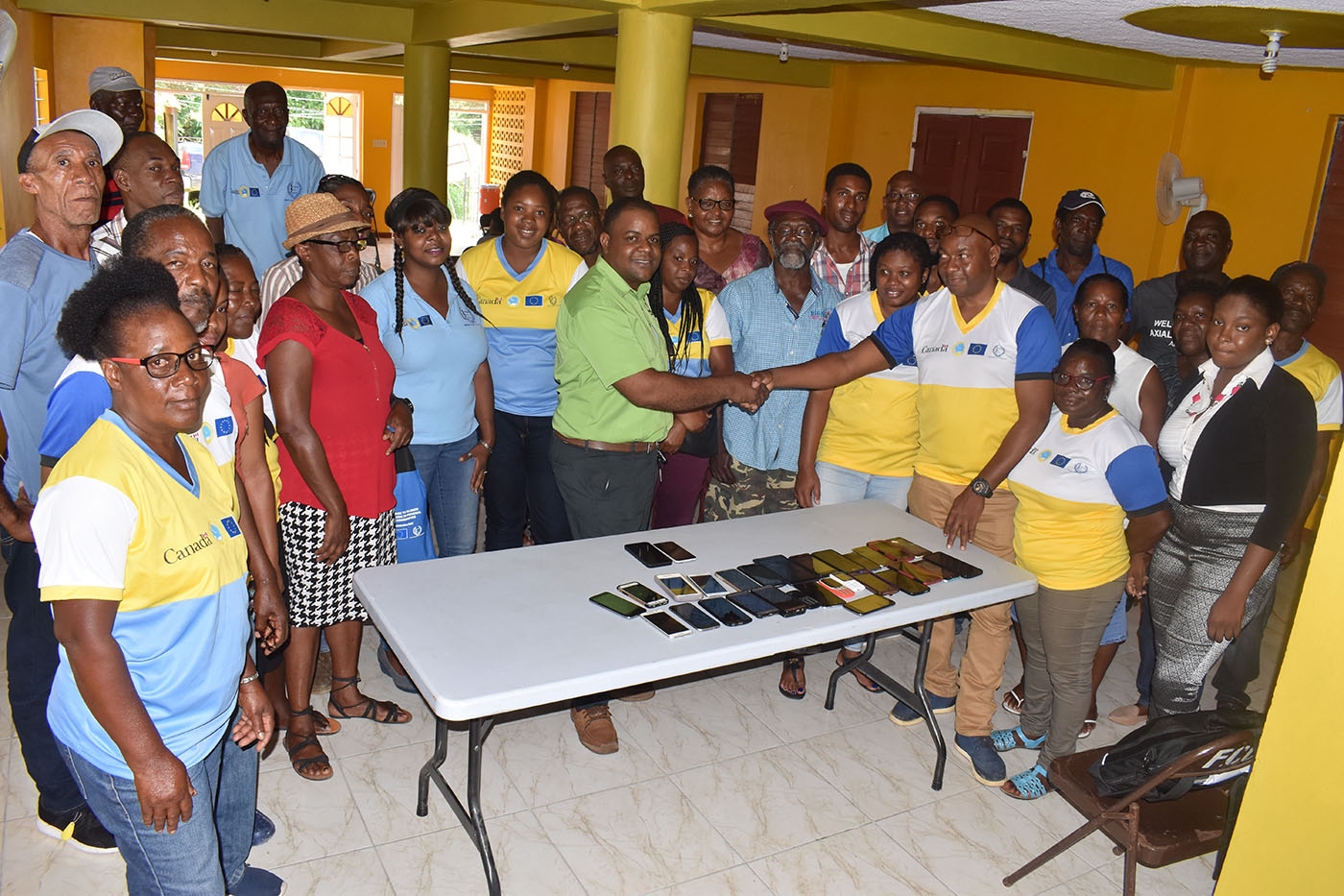 group photo of farmers at a meeting