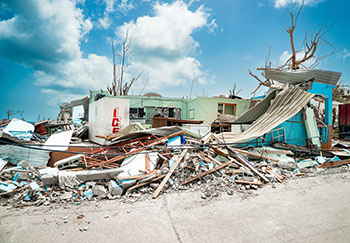 Collapsed buildings and debris in Carriacou, Grenada, after Hurricane Beryl in July 2024.