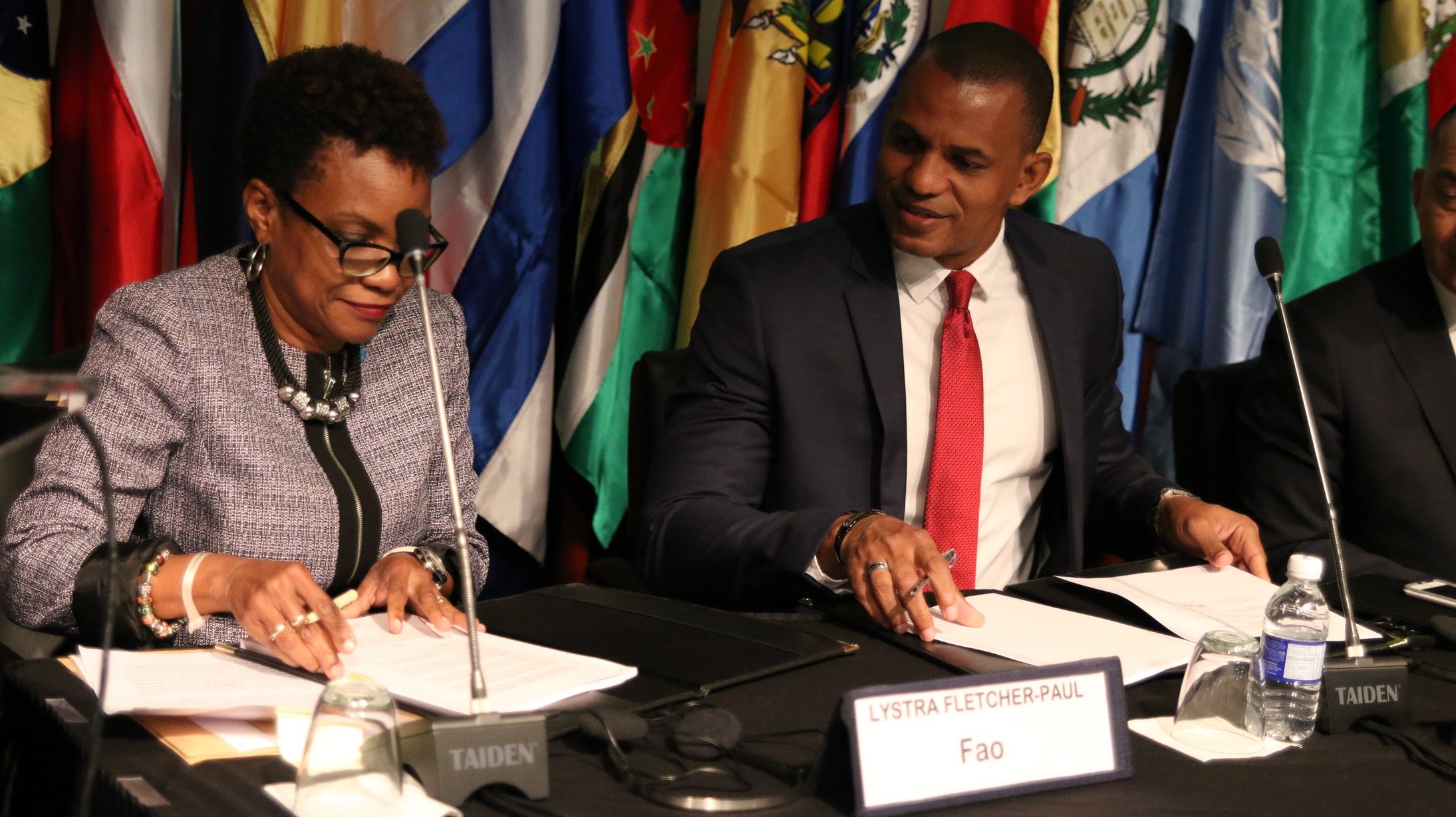 Lystra Fletcher-Paul, FAO’s Subregional Representative for the Caribbean (left) and Daniel Best, Director of Projects, CDB (right) sign the Agreement on March 5, 2018 in Montego Bay, Jamaica