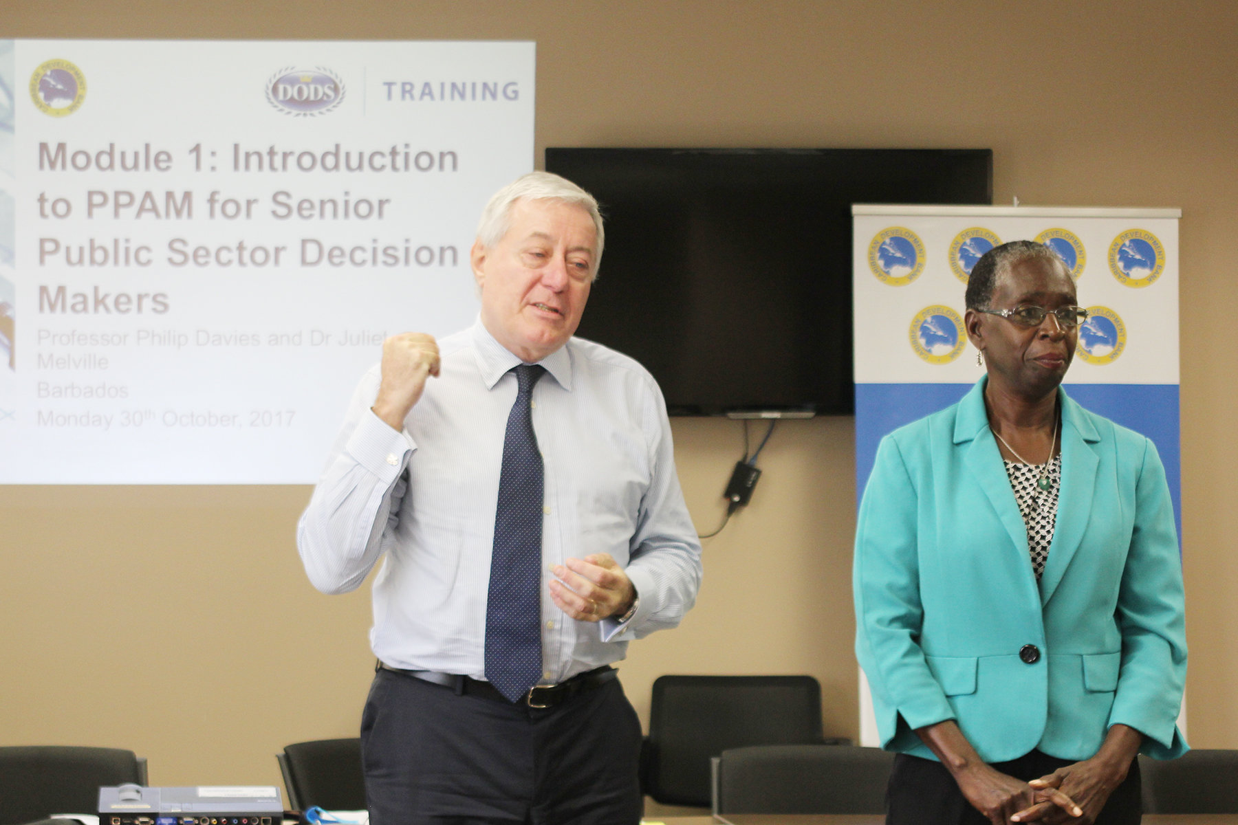 Professor Philip Davies and Dr. Juliet Melville delivering training in Barbados.