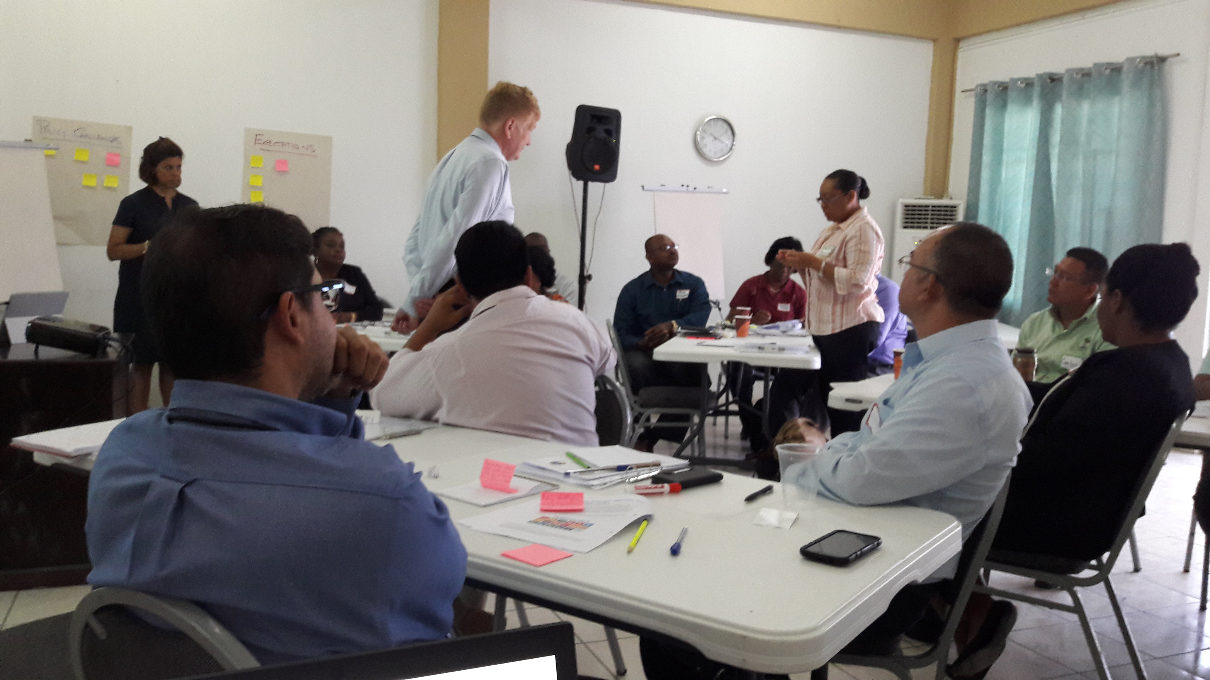 Public service officials participate in a training session on day one of the PPAM/PCM training in Belize.