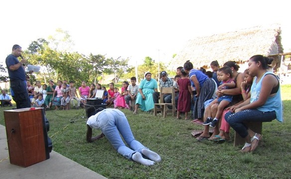 volunteer demonstrating a fire safety position