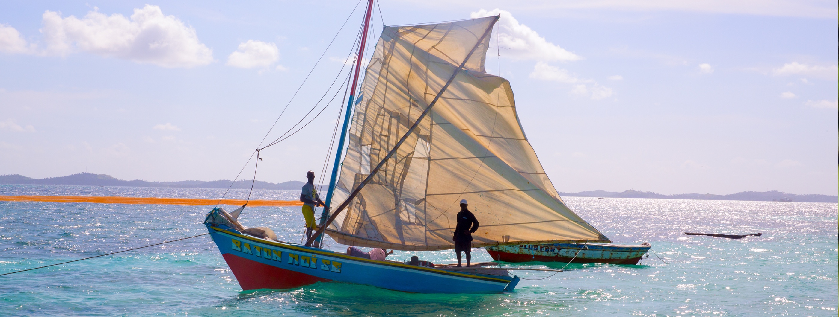 Fisherman on a sailboat