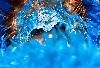 large blue feathered headpiece