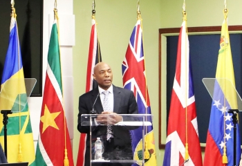 CDB President Dr Gene Leon at lectern