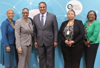 Bahamas Minister of Economic Affairs and Trade Michael Halkitis and BBSQ team