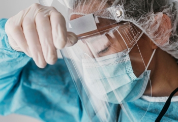 close up shot of health care worker in PPE