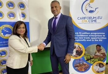 The Honourable Rishma Kuldipsingh, Minister of Economic Affairs, Entrepreneurship and Technological Innovation for Suriname and Mr. Daniel Best, Director of the Caribbean Development Bank's Projects Department, attend the launch of the Marketing and Branding of Micro, Small and Medium-sized Enterprises in CARICOM Project 