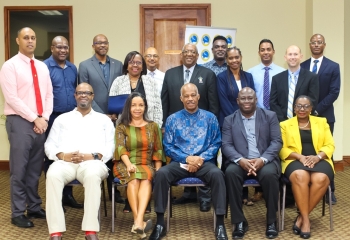 group photo of CDB and UWI representatives at project launch