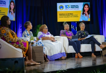 panellists seated on a stage