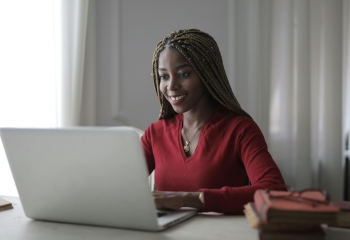Young woman at her computer