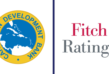 Side‑by‑side logos of the Caribbean Development Bank and Fitch Ratings. The Caribbean Development Bank logo features a yellow circular border with the words “Caribbean Development Bank” surrounding a blue map of the Caribbean region. The Fitch Ratings logo displays the words “Fitch Ratings” in red and grey text on a white background.
