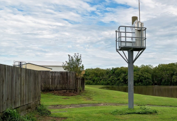 Small tower with detection equipment near a pond