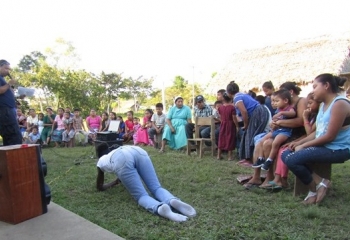 volunteer demonstrating a fire safety position